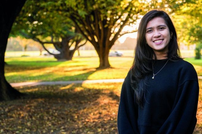 Female student outside smiling portrait