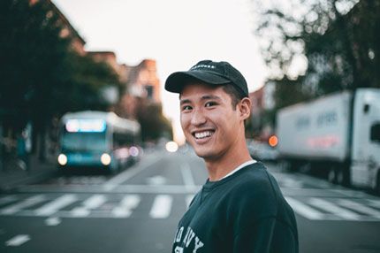 Student happy smiling outside