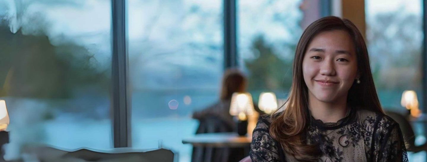 Student sitting inside