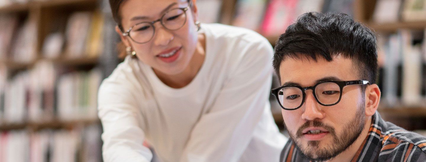 Student teacher library working studying