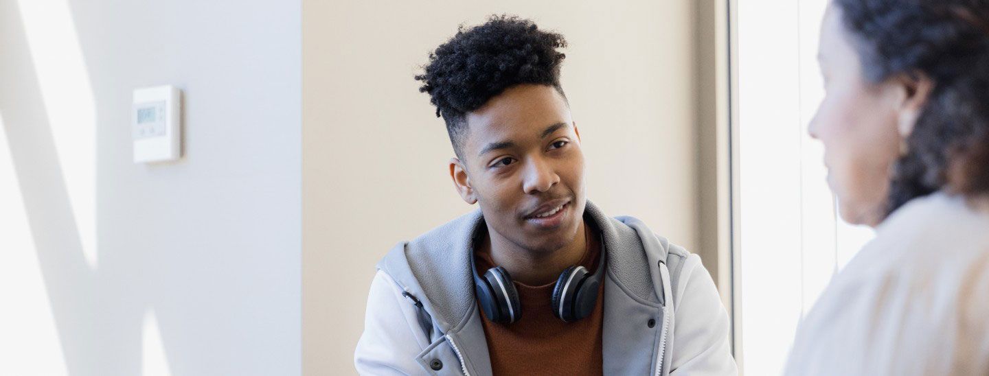 Student teacher meeting inside campus