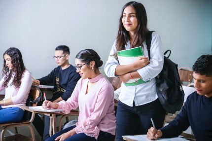 Students classroom working exam