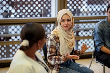 Students on campus talking