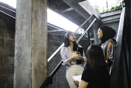 Students talking outside campus