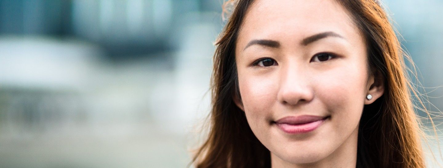 Woman outside smiling happy portrait