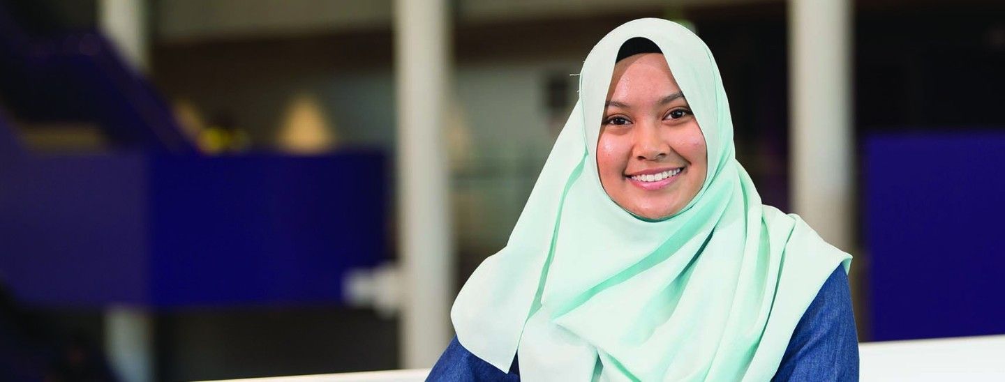 Woman smiling wearing hijab